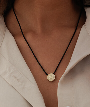 Joolets collection: rings, bracelets, and necklaces in sterling silver, styled with interchangeable Joollions.